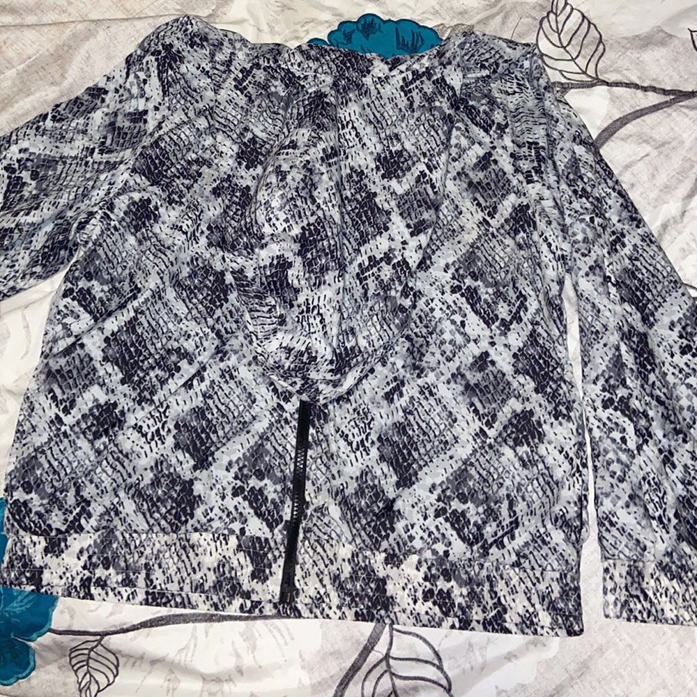 Snakeskin print rain jacket from pink